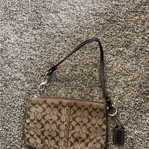 Brown coach wristlet